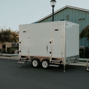 Trailer set up at an outdoor wedding